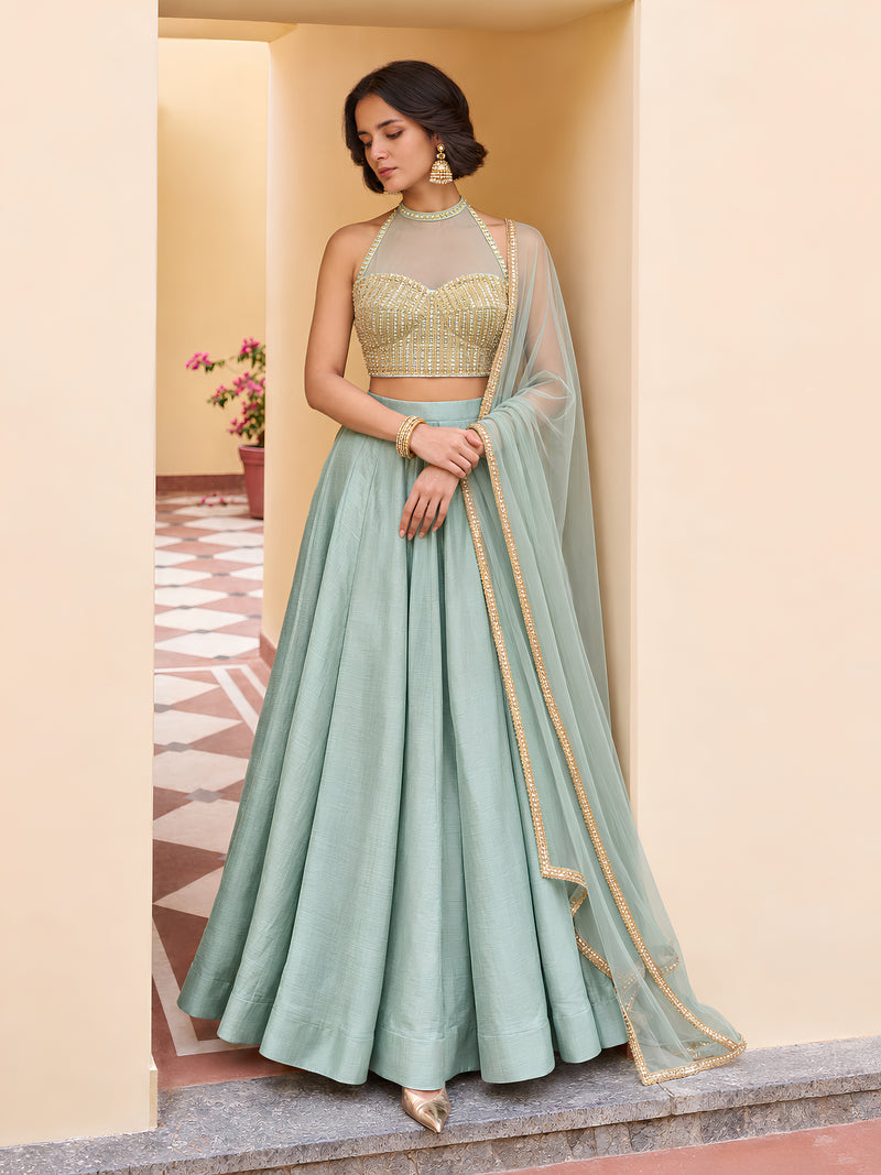 Mira mint green embellished lehenga set with beaded halter choli, full flared skirt and sheer net dupatta