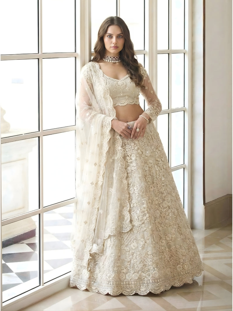 Ivory Color Heavy Embroidered Net Lehenga Choli With Dupatta