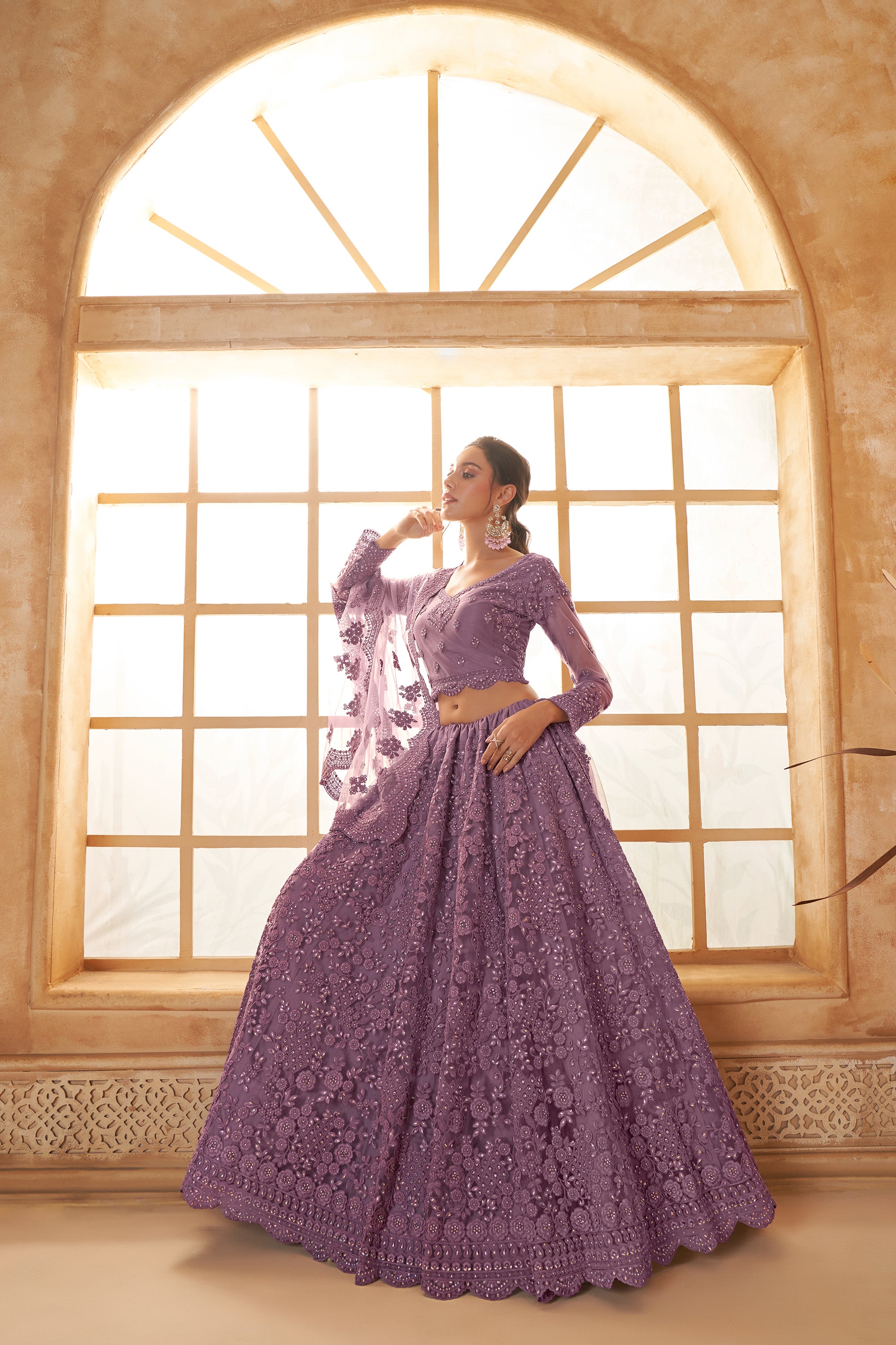 Purple Color Heavy Embroidered Net Lehenga Choli With Dupatta