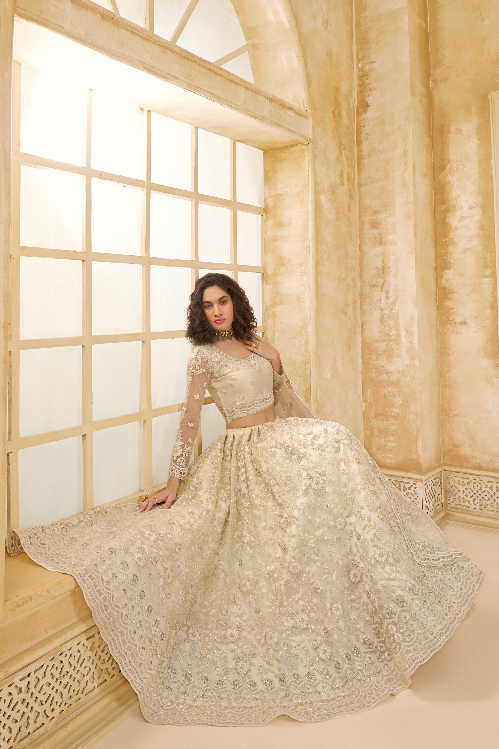 Ivory Color Heavy Embroidered Net Lehenga Choli With Dupatta