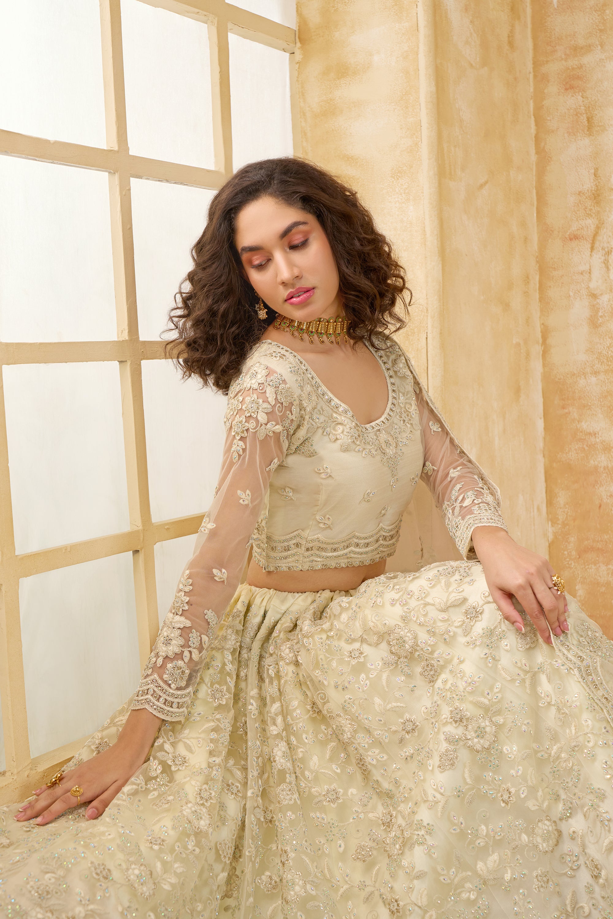 Ivory Color Heavy Embroidered Net Lehenga Choli With Dupatta