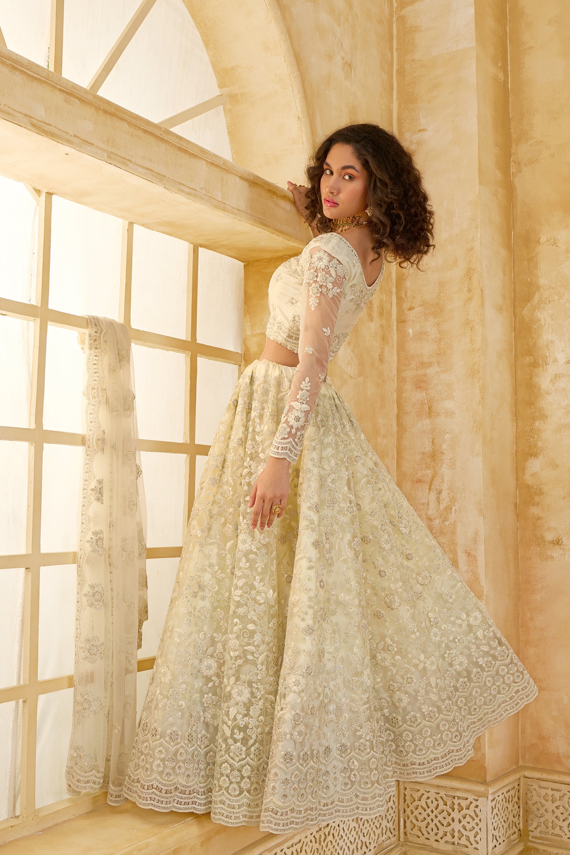 Ivory Color Heavy Embroidered Net Lehenga Choli With Dupatta