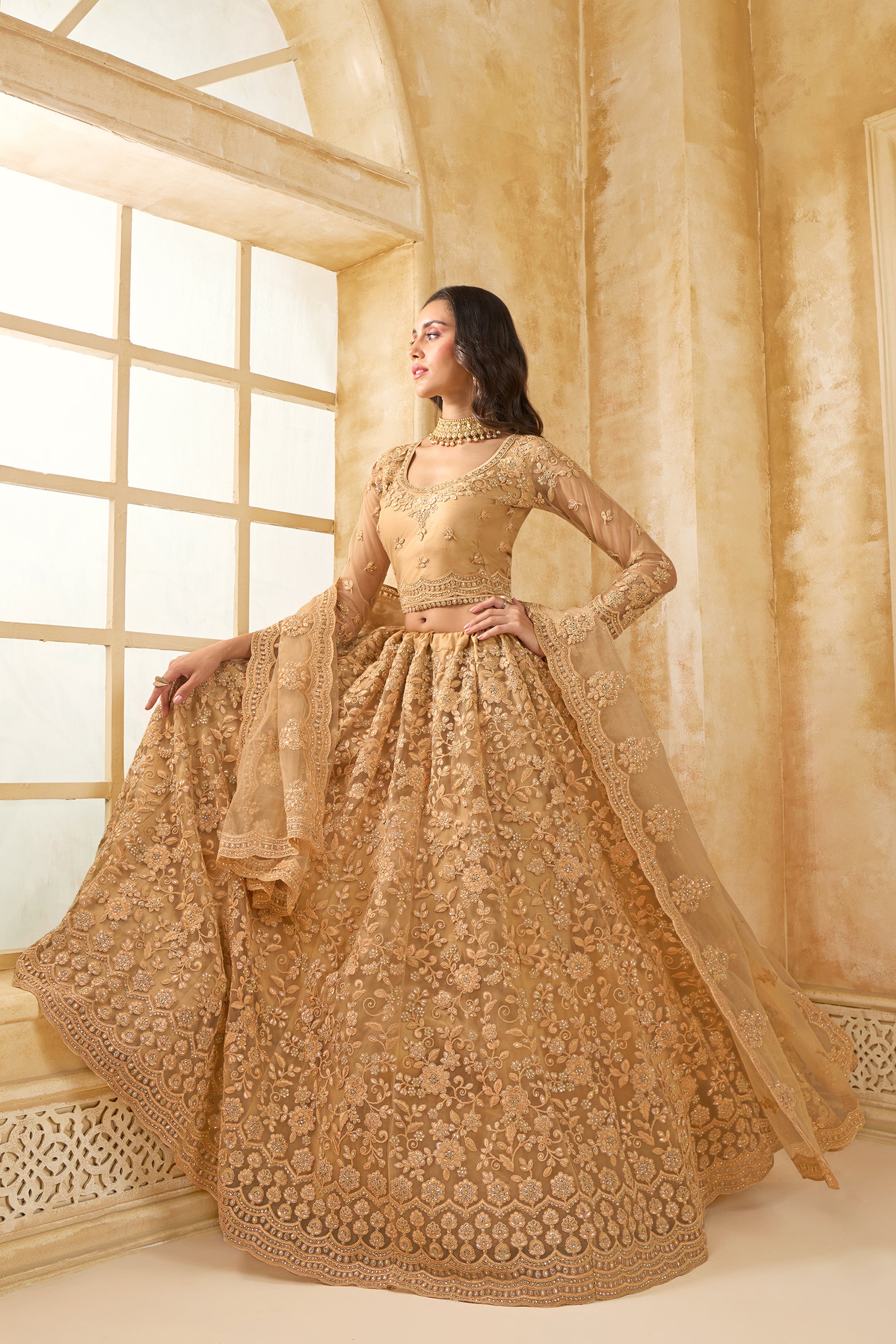 Golden Color Heavy Embroidered Net Lehenga Choli With Dupatta