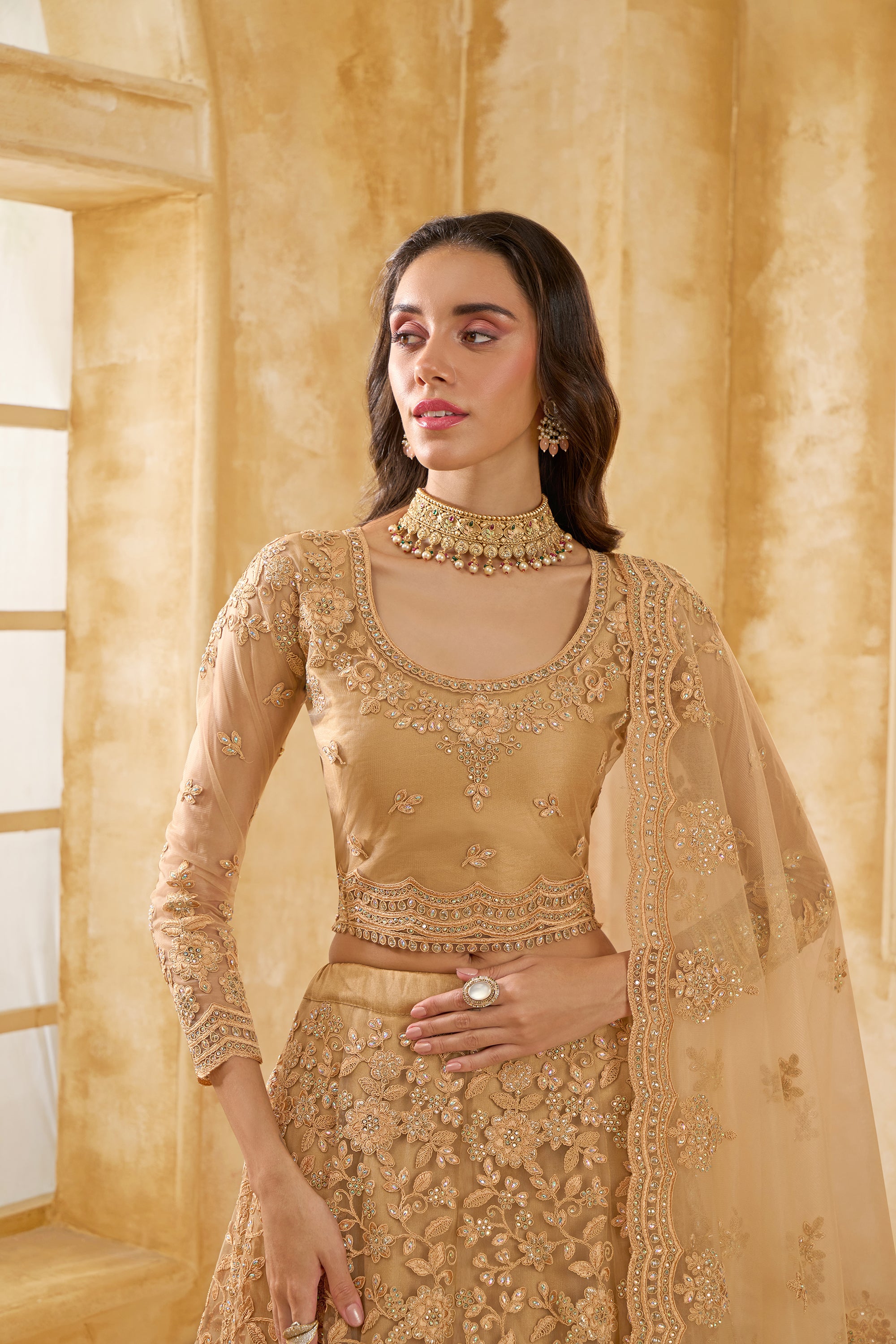 Golden Color Heavy Embroidered Net Lehenga Choli With Dupatta