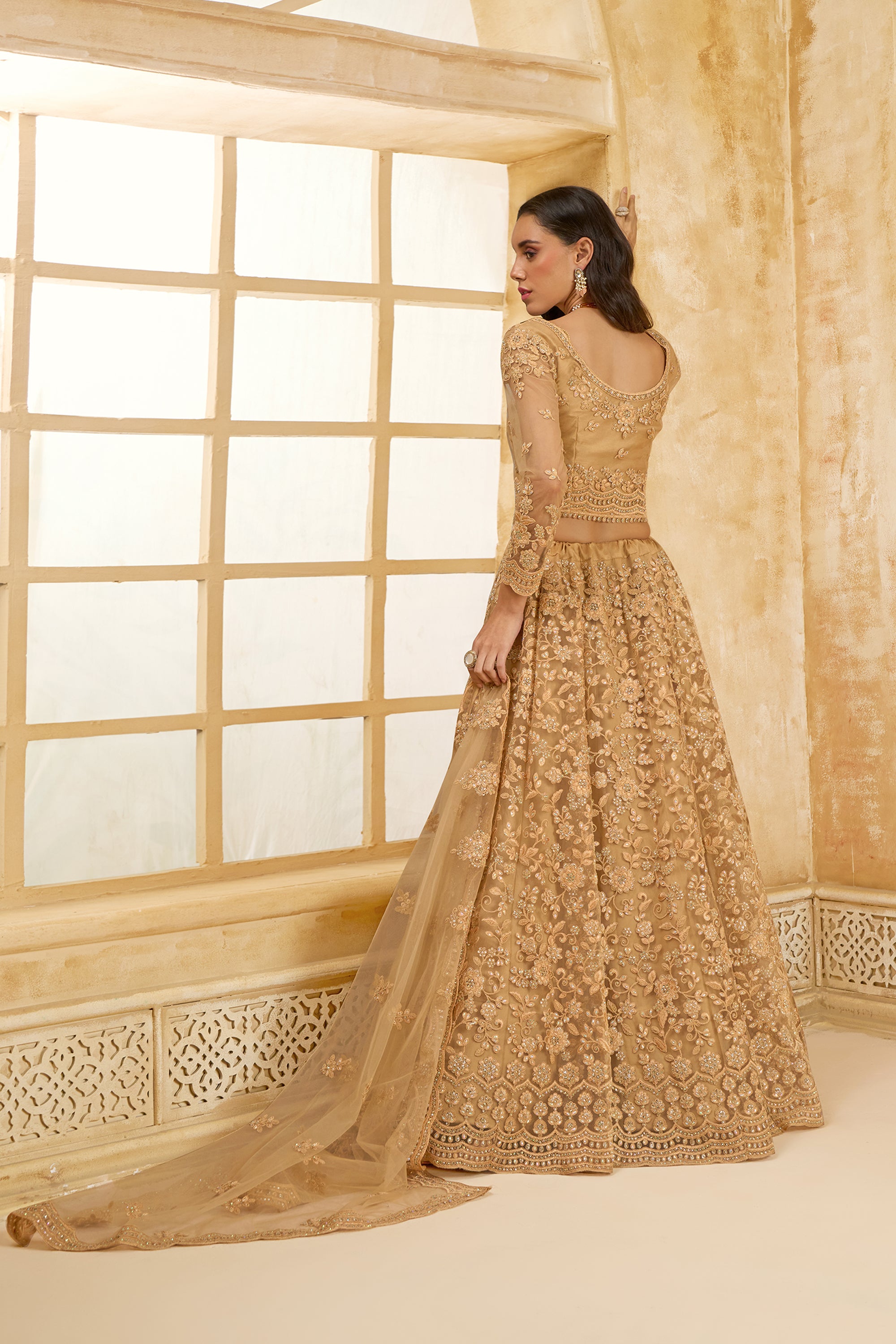 Golden Color Heavy Embroidered Net Lehenga Choli With Dupatta