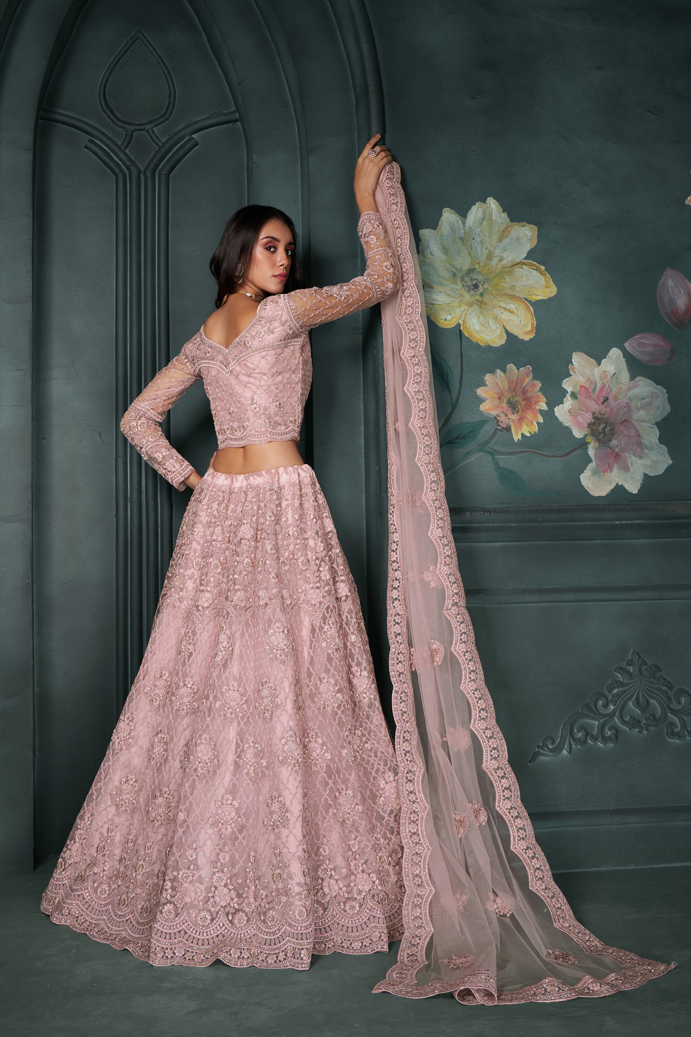 Blush Pink Heavy Embroidered Net Lehenga Choli