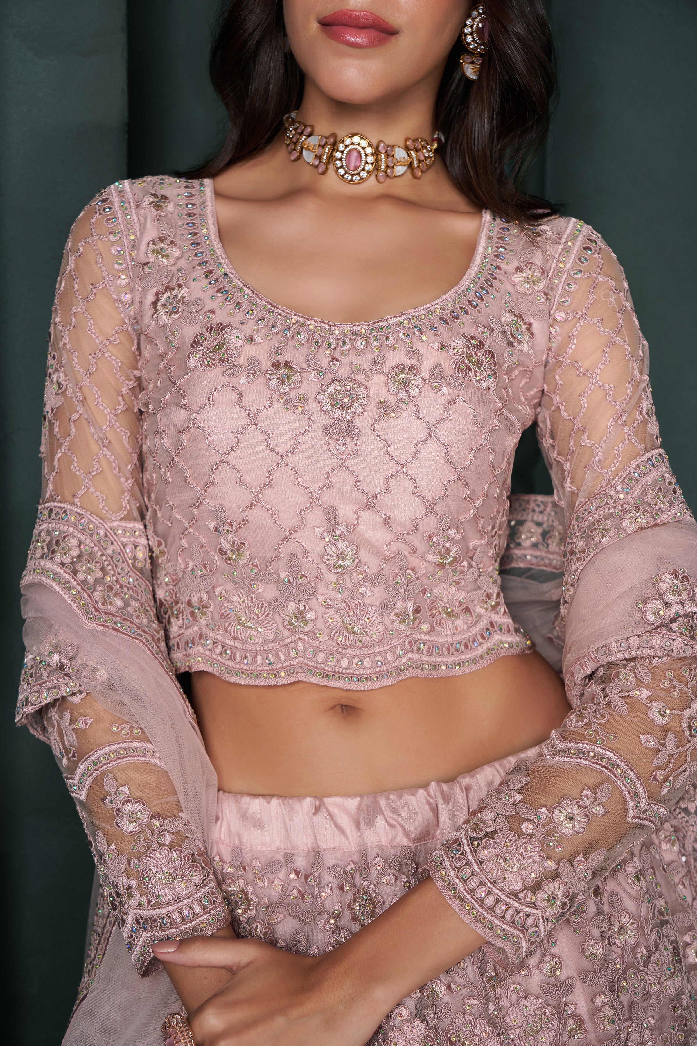 Blush Pink Heavy Embroidered Net Lehenga Choli