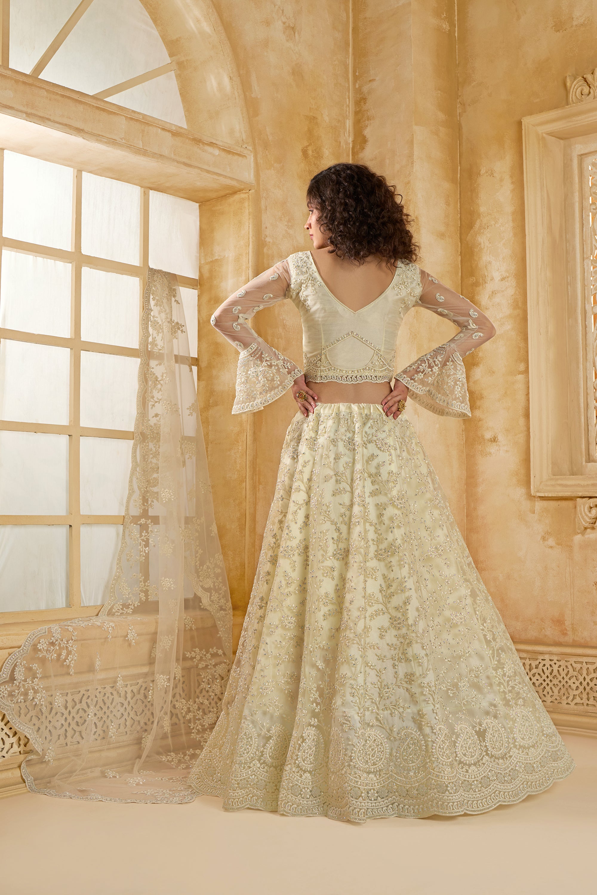 Ivory Color Heavy Embroidered Net Lehenga Choli With Dupatta