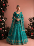 Luxury teal bridal lehenga with embroidered butterfly net and ornate borders