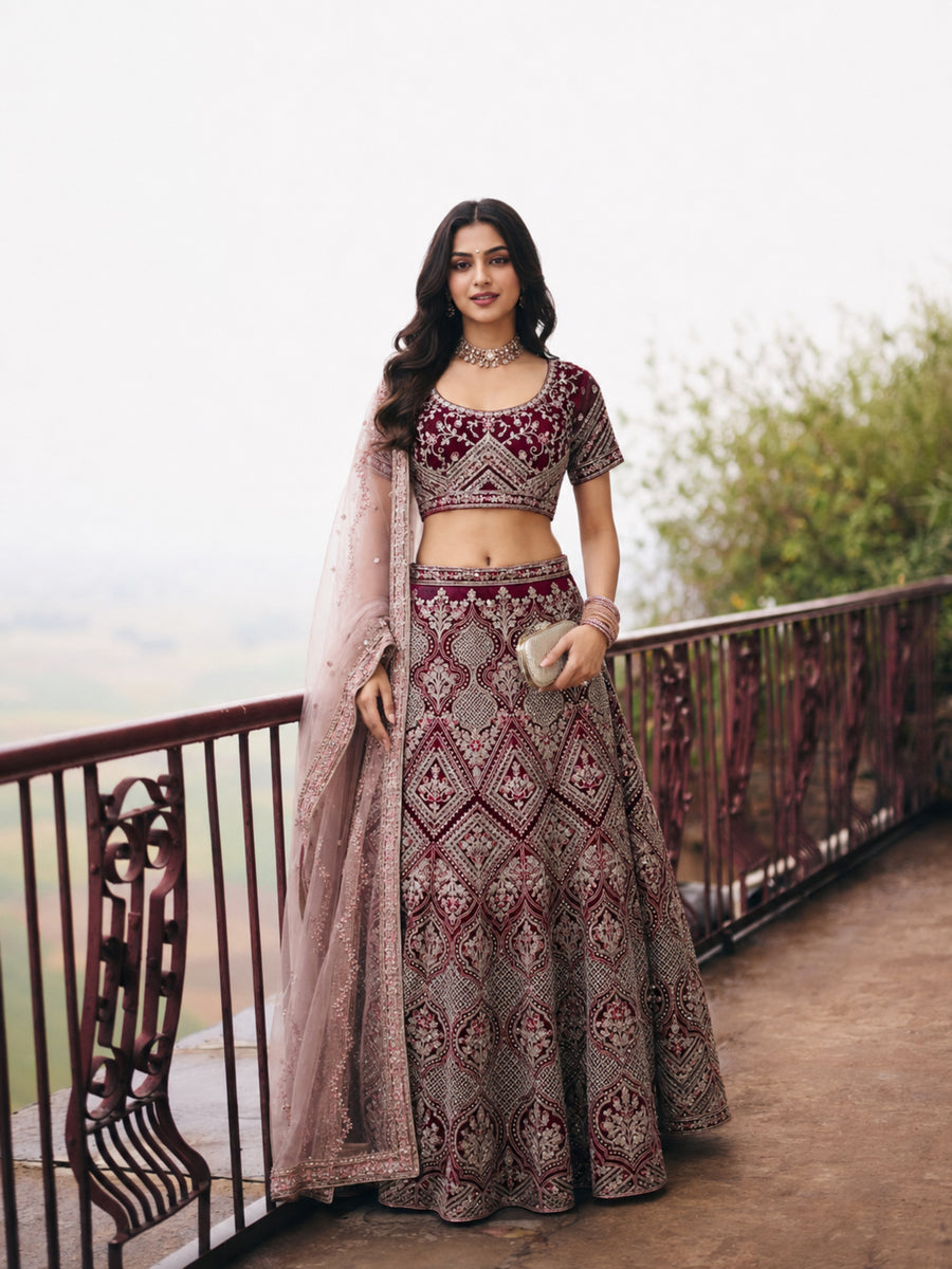 Vera burgundy embroidered lehenga set with detailed blouse, full flared skirt and blush net dupatta