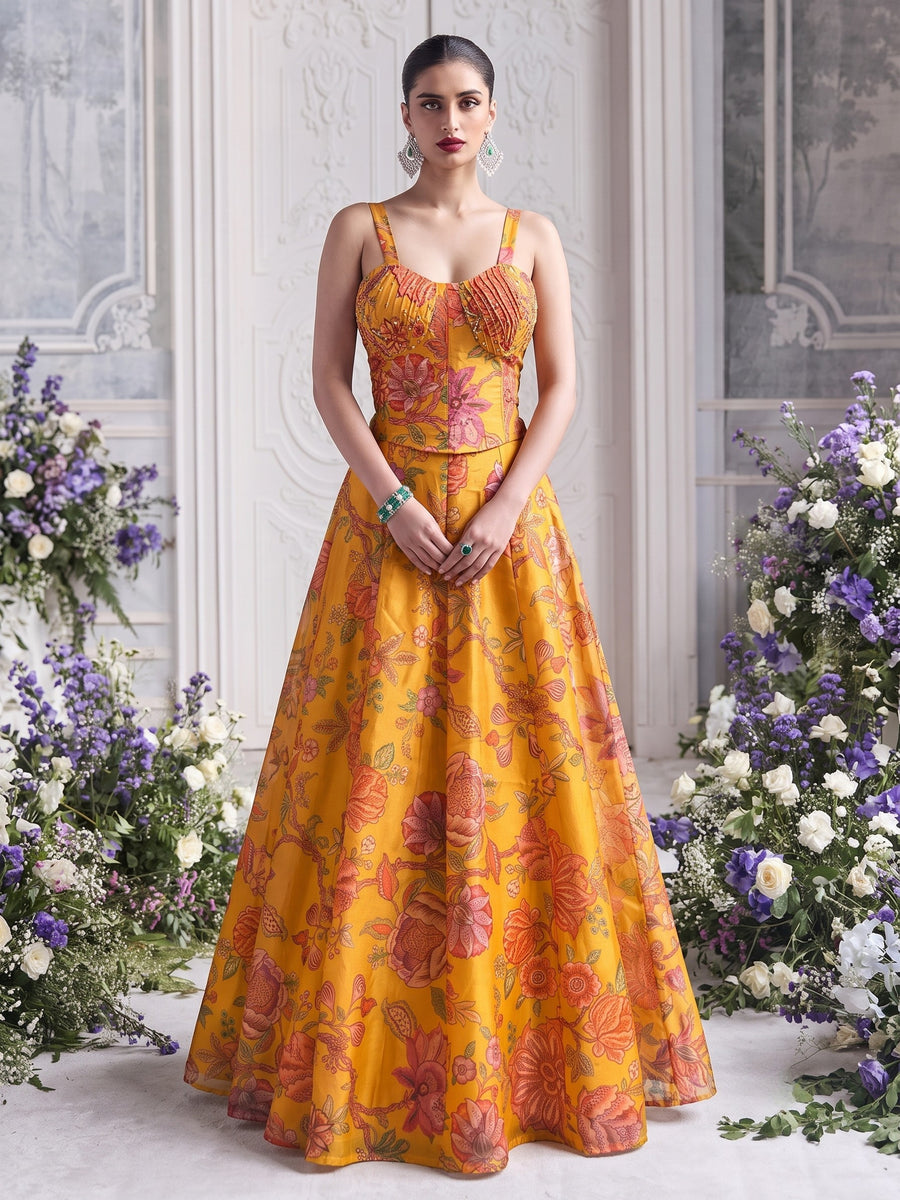 Floréa Golden Marigold printed Tabby Organza lehenga set featuring a structured corset blouse and floral designer lehenga for haldi and destination weddings.
