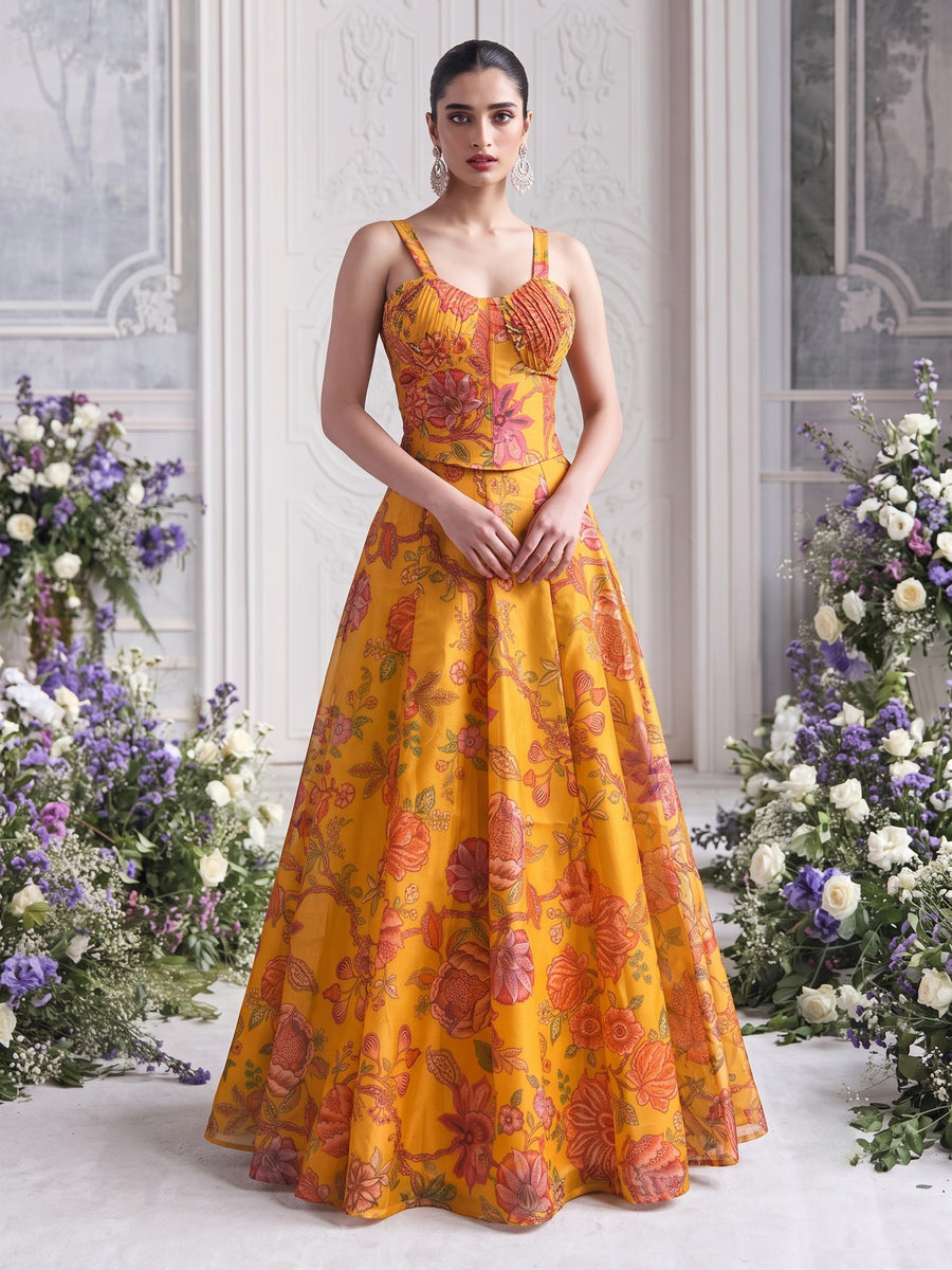 Luxury yellow floral designer lehenga crafted in printed Tabby Organza with elegant festive silhouette for wedding celebrations.