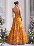 Back view of Floréa Golden Marigold lehenga showcasing the adjustable lace-up corset back and full flared printed lehenga.