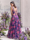 Back view of Floréa Royal Purple designer lehenga showcasing the adjustable lace-up corset back and premium floral printed Tabby Organza lehenga.