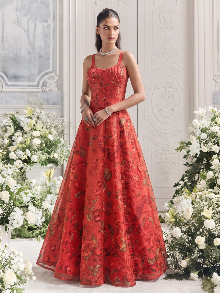 Front angle view of the Floréa Scarlet Red designer floral lehenga with a structured corset blouse and flowing printed Organza silhouette.