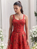 Close-up of the Floréa Scarlet Red corset blouse highlighting the floral print, structured tailoring and premium Tabby Organza craftsmanship.