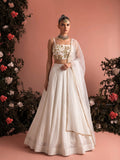 Ivory embroidered lehenga set styled with sheer net dupatta and delicate border