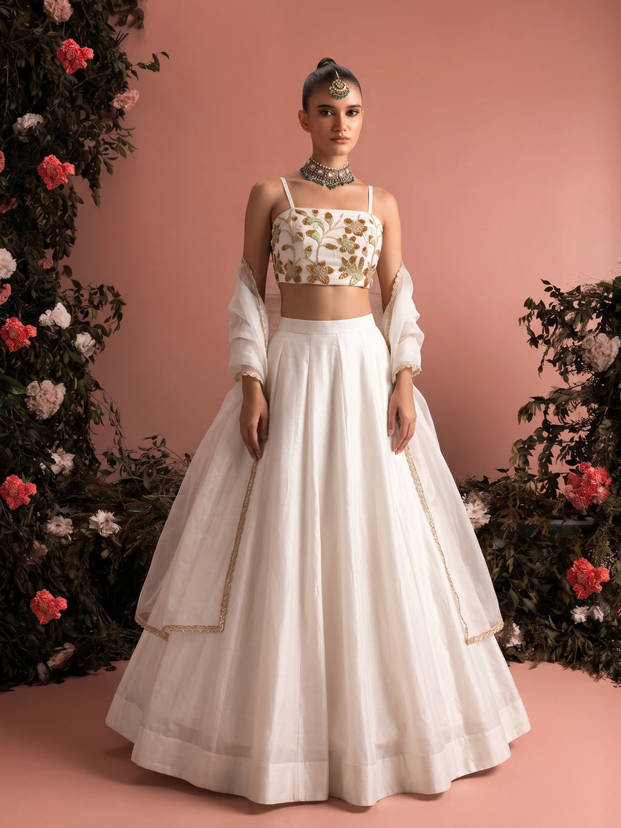 Liora ivory embroidered lehenga set with beaded crop blouse, flowing skirt and sheer dupatta