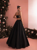 Back view of Liora black embroidered lehenga set with strappy blouse and full flared skirt