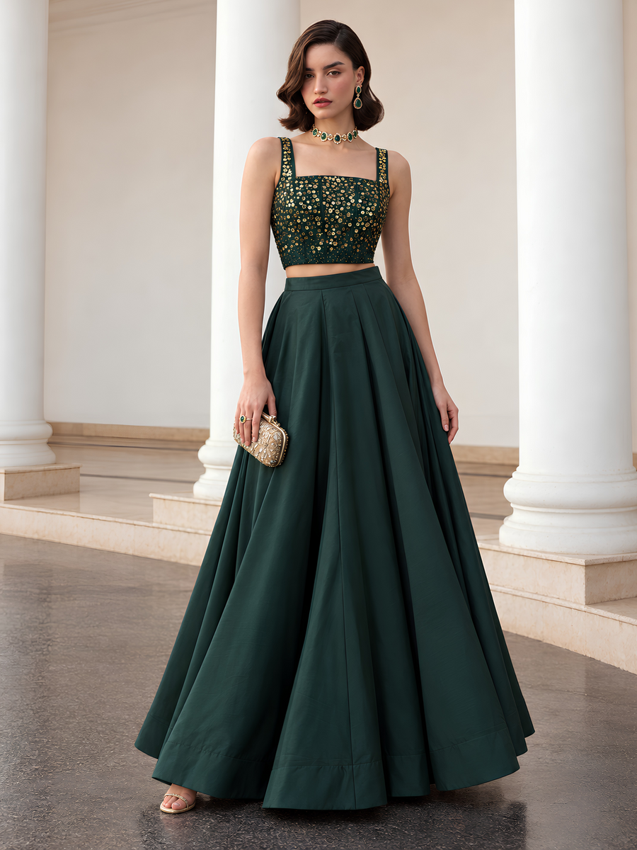 Midnight Noir deep emerald green lehenga set with gold-embellished square-neck choli and full flared skirt