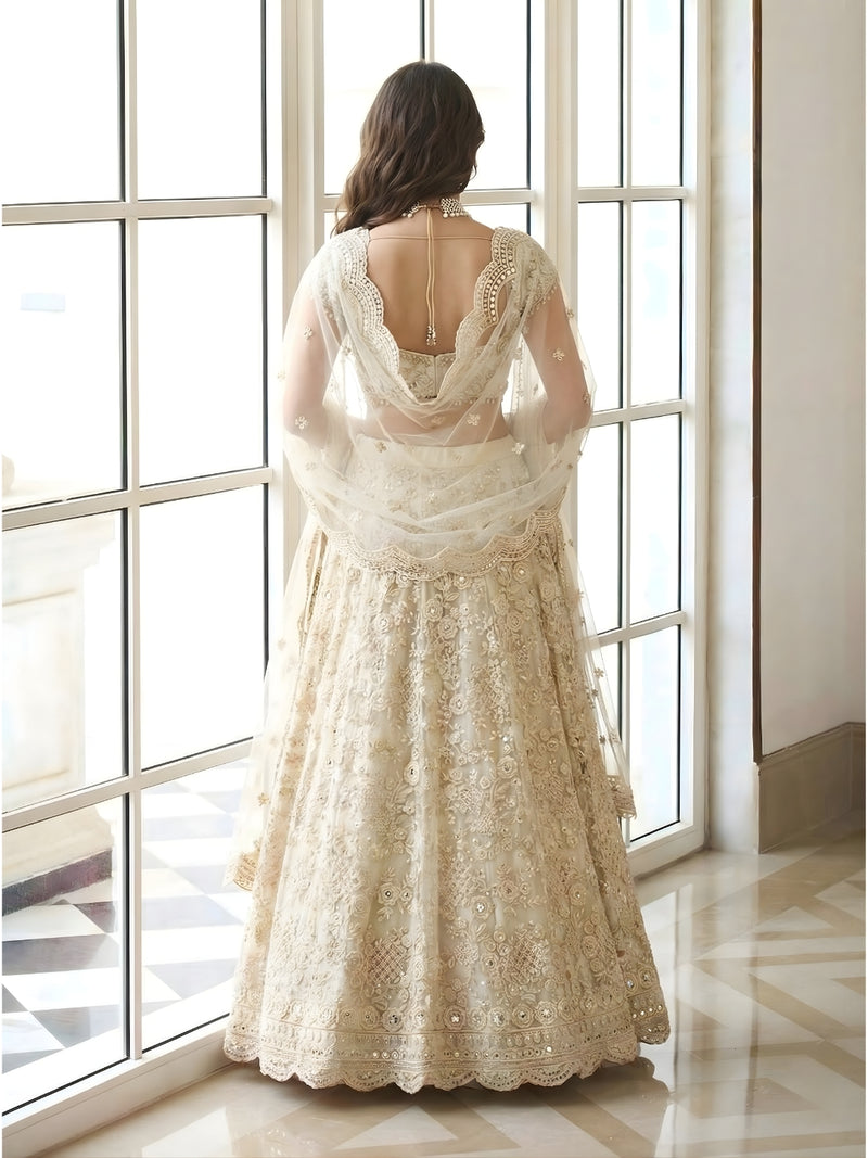 Ivory Color Heavy Embroidered Net Lehenga Choli With Dupatta