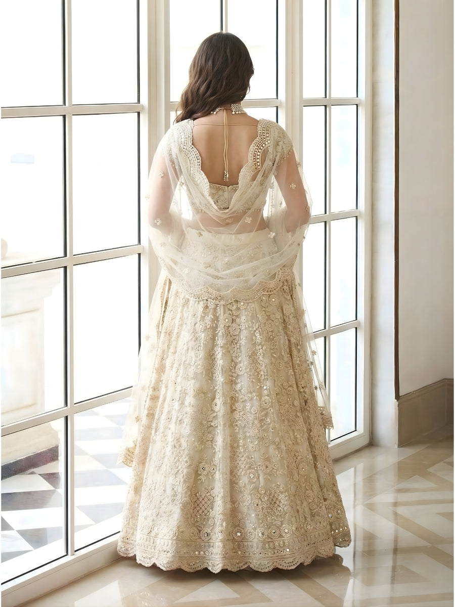 Ivory Color Heavy Embroidered Net Lehenga Choli With Dupatta