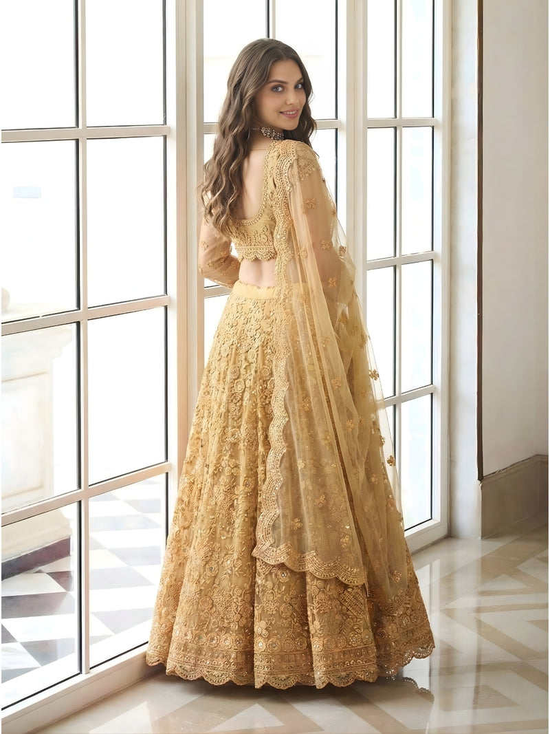 Golden Color Heavy Embroidered Net Lehenga Choli With Dupatta