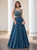 Midnight Noir teal blue lehenga set with gold-embellished square-neck choli and full flared skirt