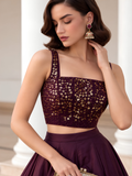 Close-up of the Midnight Noir plum choli showing intricate gold embellishment, square neckline and slim straps