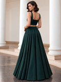 Back view of the deep green lehenga set showing the smocked choli panel and full flared skirt