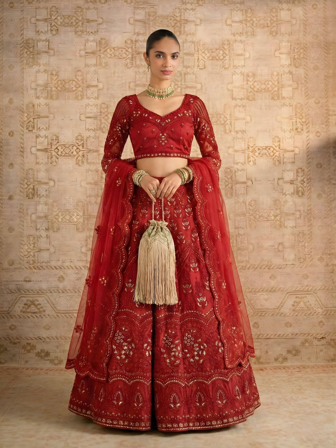 model wearing red bridal lehenga wedding look,  bride style red lehenga full outfit look, 
bridal lehenga with dupatta drape styling